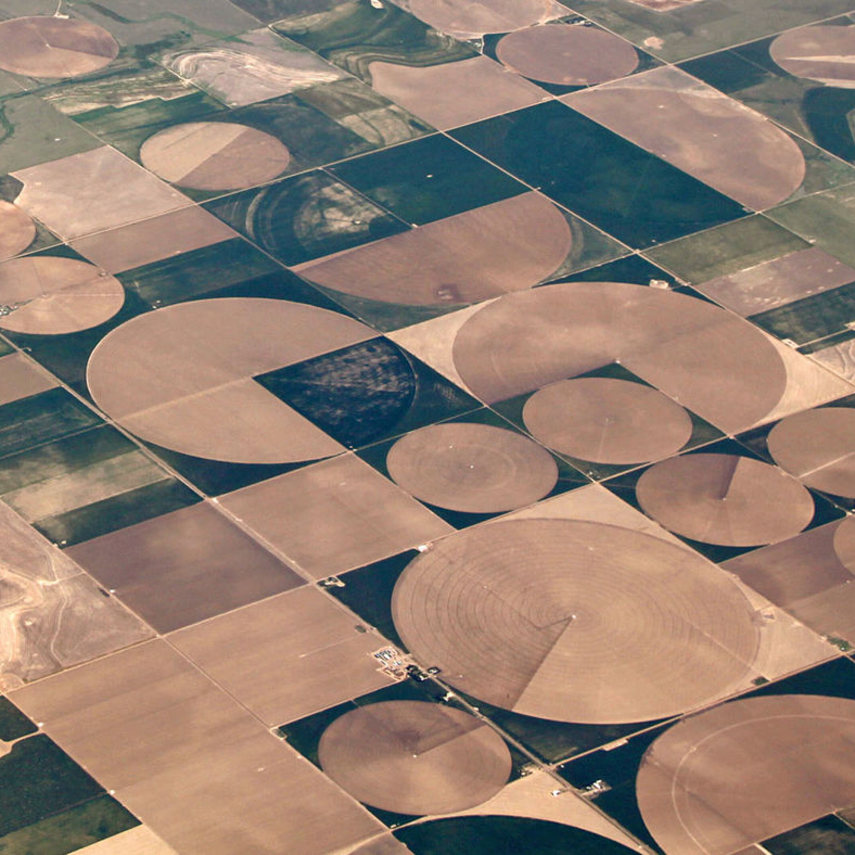 Sending flocks of tiny satellites out past Earth orbit and solving the irrigation efficiency paradox