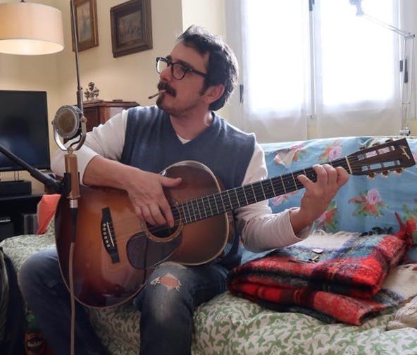 Sitting with Italian singer-songwriter Andrea Tarquini Sitting with Italian singer-songwriter Andrea Tarquini