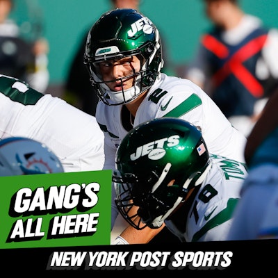 New York Jets quarterback Zach Wilson (2), offensive coordinator Mike  LaFleur and quarterback Mike White (5) make their way to a joint NFL  football training camp practice with the Green Bay Packers