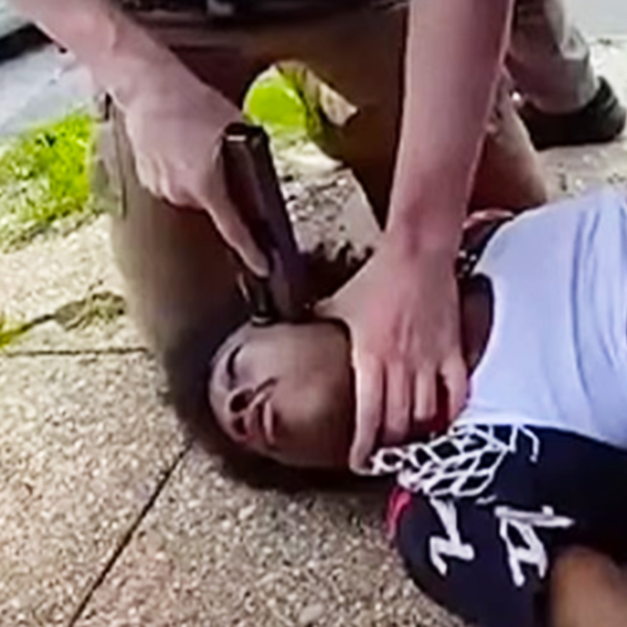 Cop Presses His Gun On Head Of Innocent Man