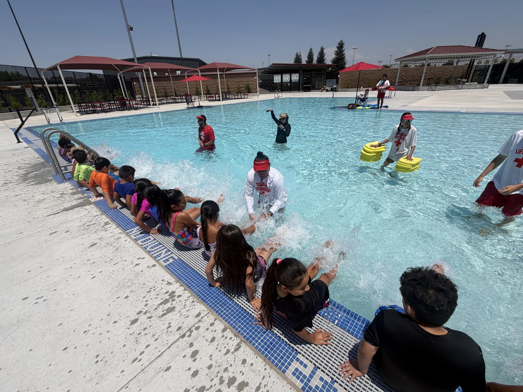 Kids Learning to Swim at Community Pool in Central Valley