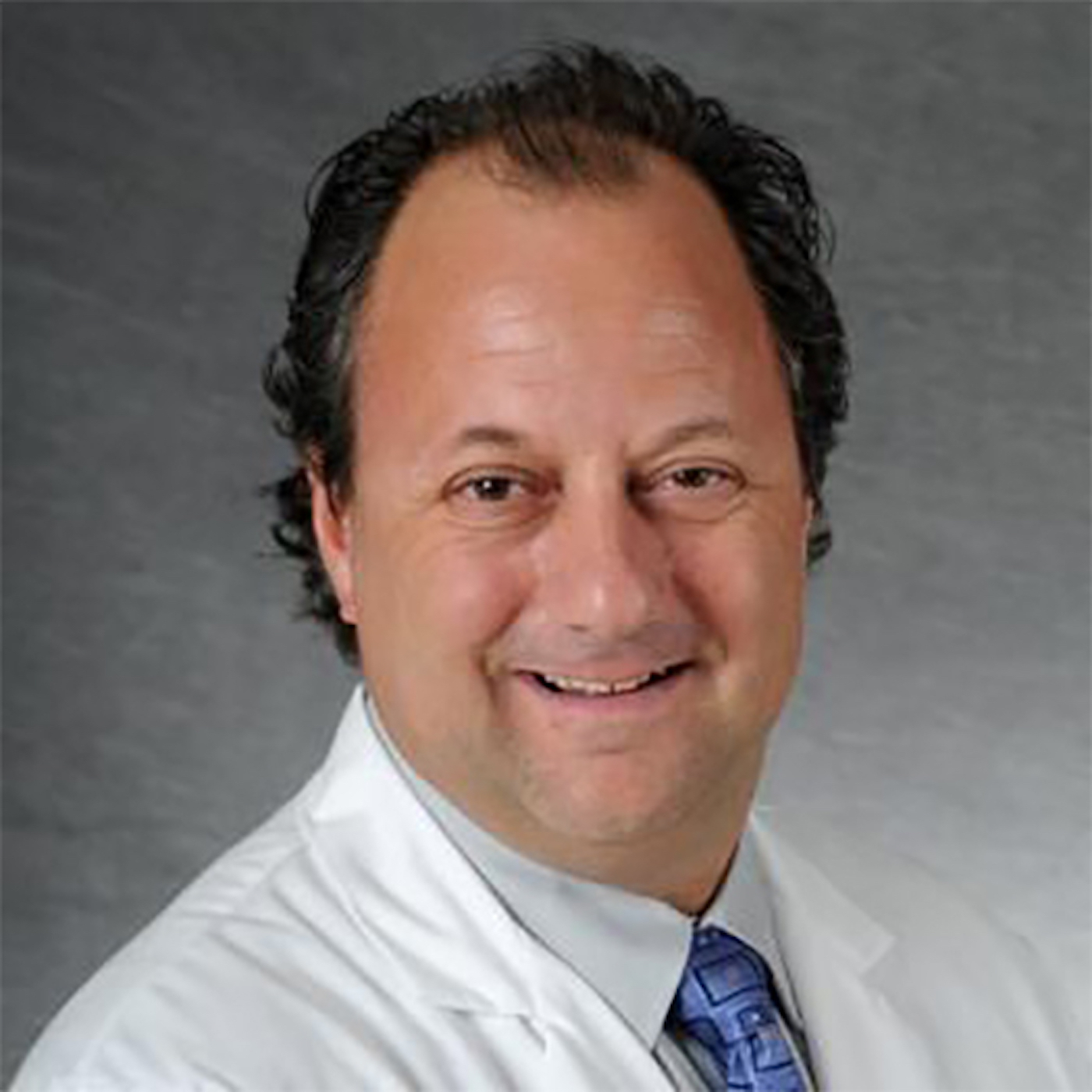 Ep. 569 Advances & Challenges in Carotid Artery Stenting with Dr. Wayne Olan